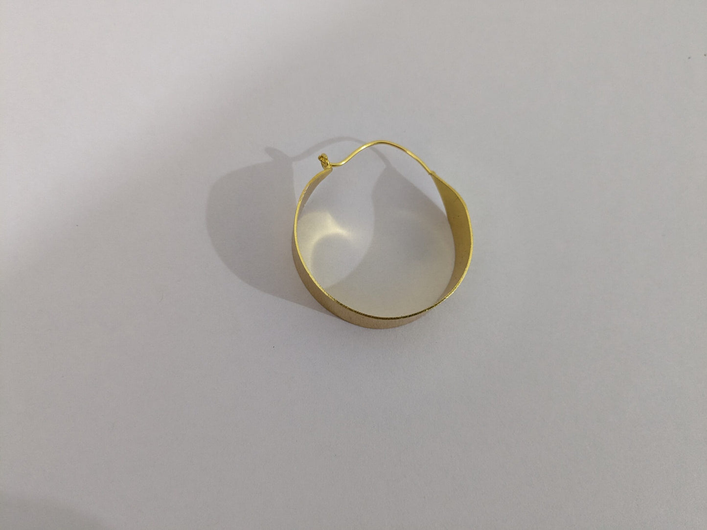 Brass Elegant Curves Hoop earring with gold plating