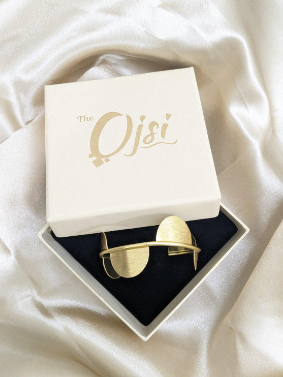 Brass lunar embrace bracelet